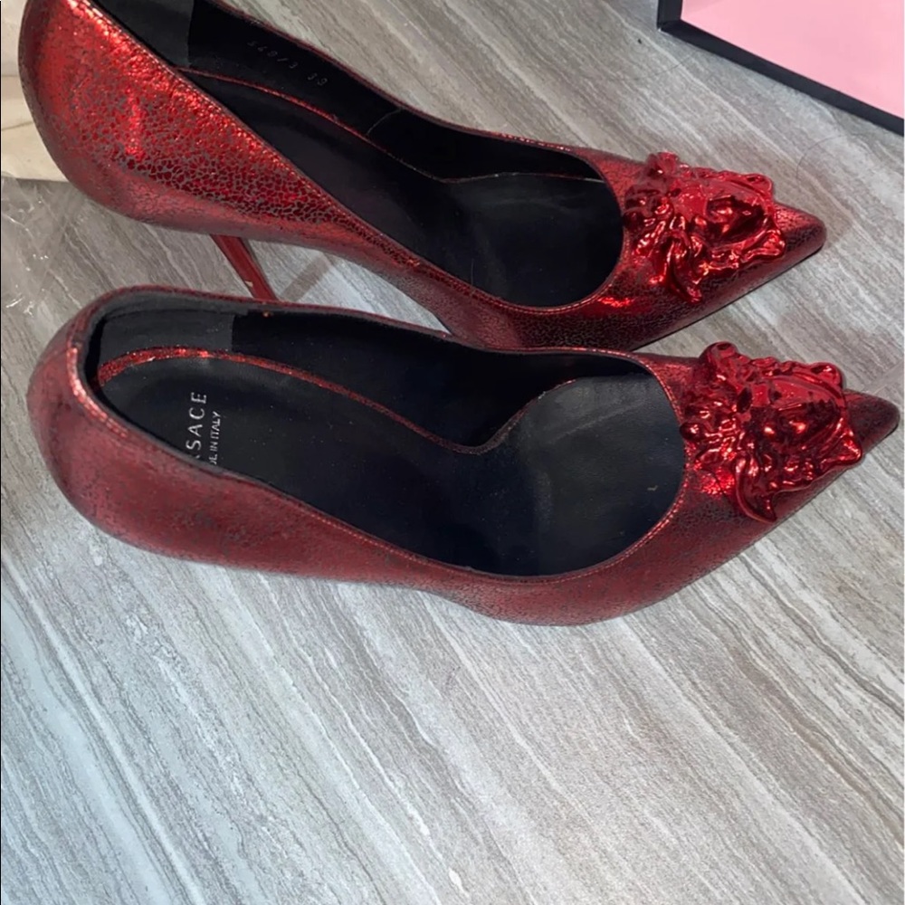 Red Versace heels